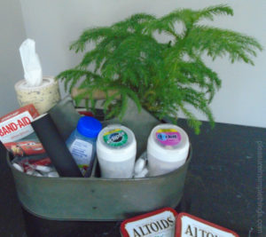 mens bathroom basket at botanical wedding