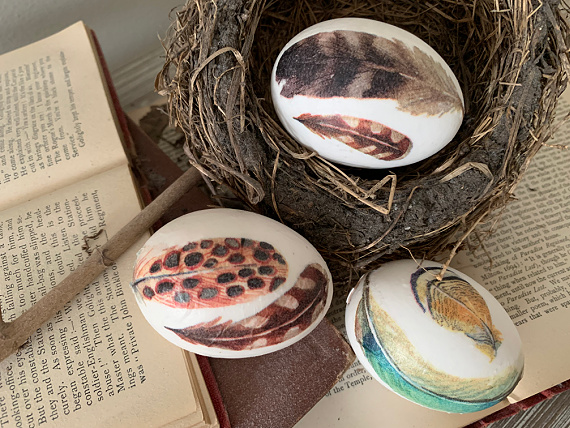 feathers on easter eggs
